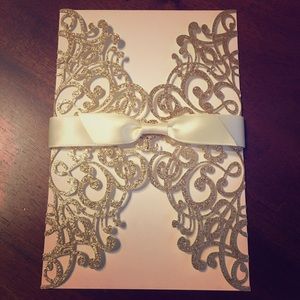 Glitter , laser cut invitations .